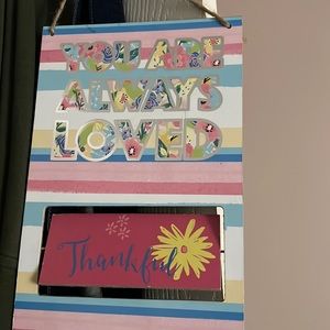 A door sign you can hung up in your house .